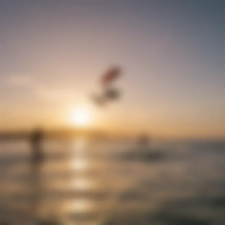 Group of kiteboarders enjoying a vibrant sunset