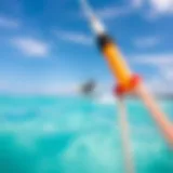 Kiteboarder gliding over turquoise waters
