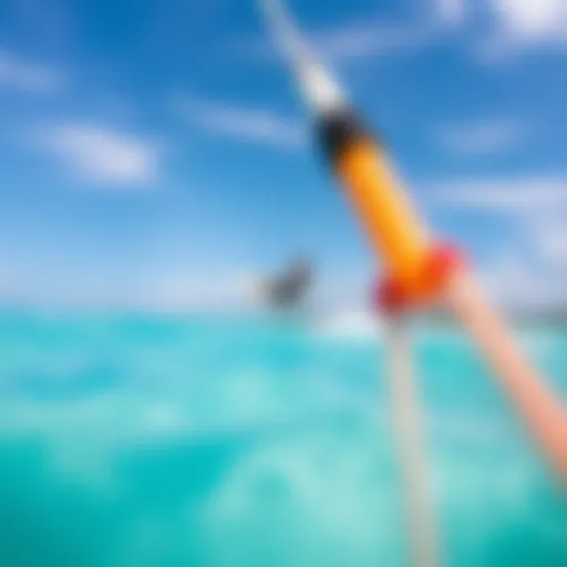 Kiteboarder gliding over turquoise waters