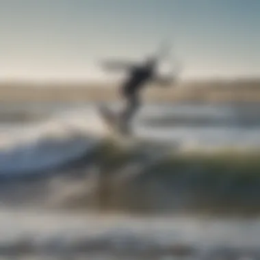 Kiteboarder riding the waves with tidal patterns in the background