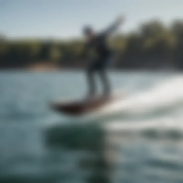 A rider effortlessly gliding over water on a Cabrinha foilboard