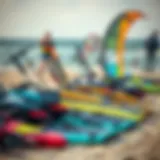 Diverse Kitesurfing Gear on Display Kitesurfing equipment arranged on the beach, showcasing various kite sizes.