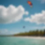 A vibrant kiteboarding scene at Coconut Bay, showcasing colorful kites against a clear blue sky