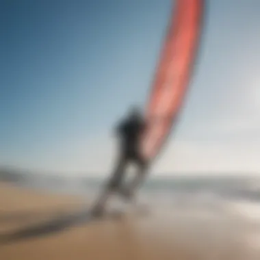 Kite surfer adjusting lines on the beach, emphasizing maintenance practices