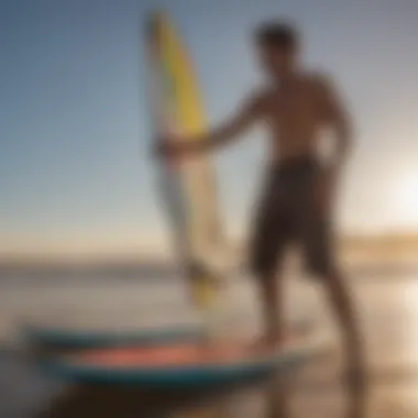 A person examining the features of a used kite board before purchase.