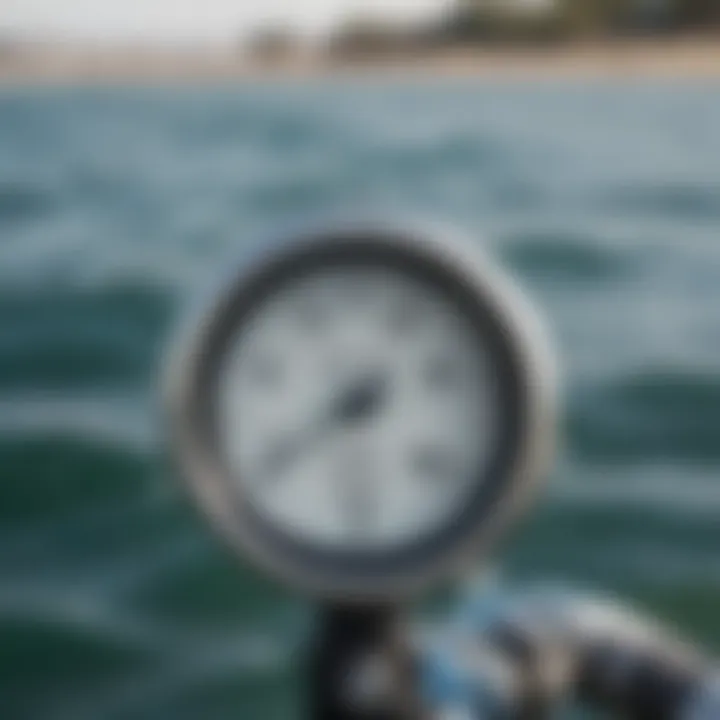 Close-up of water temperature gauge with ocean in the background