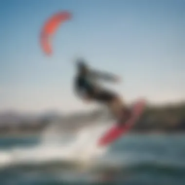 Kiteboarder gliding across the water at Doheny State Beach