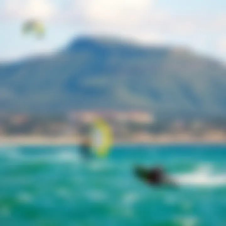 Thrilling Watersports Landscape A scenic beach view with kitesurfers in the background