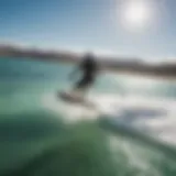 Kiteboarder gliding over the azure waters of Baja