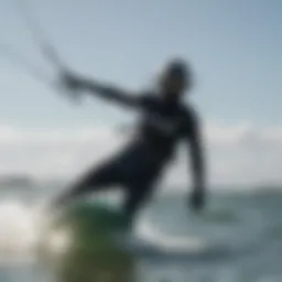 Dynamic kiteboarding action showcasing a rider in a 6mm wetsuit