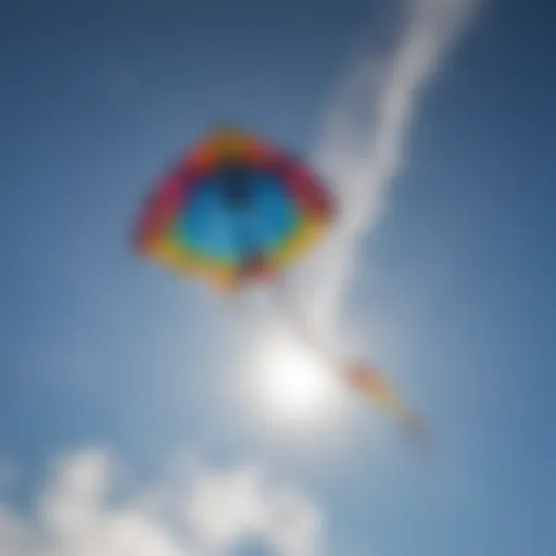 A vibrant kite soaring through a clear blue sky, showcasing its design and colors.