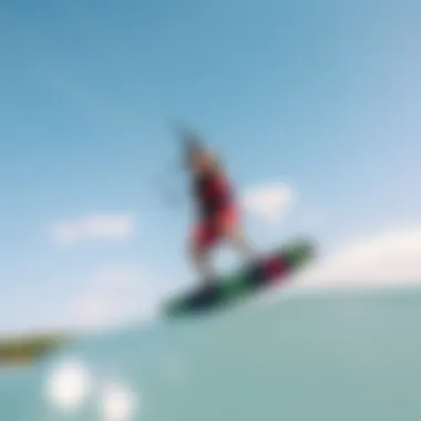 Kiteboarder executing a maneuver with a fusion wing on water