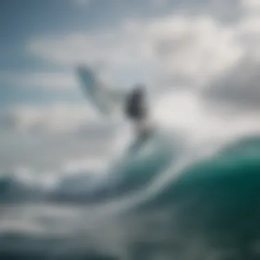 A kiteboarder skillfully maneuvering the hydrofoil board amidst ocean waves