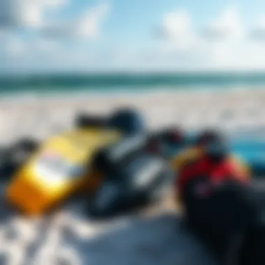 Essential kite surfing gear laid out on the beach