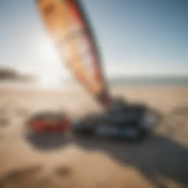 Variety of kite surfing gear displayed on the beach