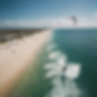 A breathtaking aerial shot captured during a kiteboarding session, highlighting the beauty of the ocean.