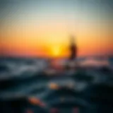 Kitesurfing at sunset over the ocean