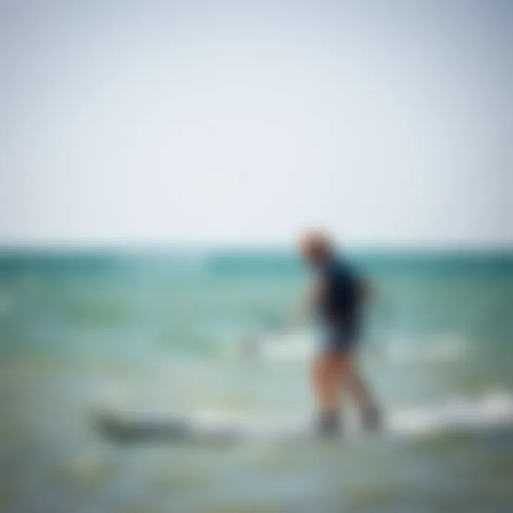 An instructor guiding a beginner kitesurfer on a calm day