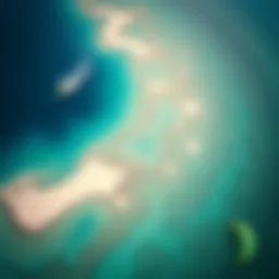 A stunning aerial view of Molasses Reef showcasing its vibrant waters and kiteboarding spots.