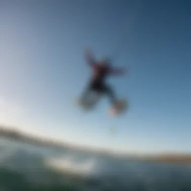 Kiteboarder executing a jump with GoPro mounted for aerial shots