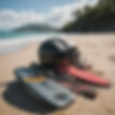 Equipment laid out for kiteboarding on the beach