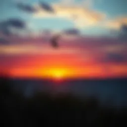 A breathtaking view of a power kiter soaring across a vibrant sunset