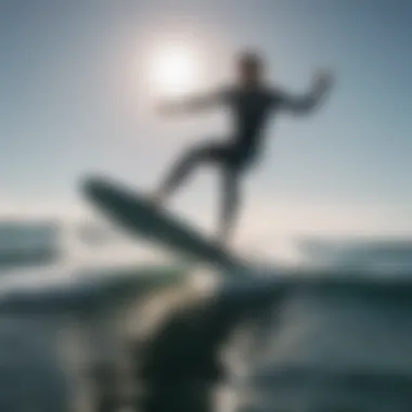 Aerial view of a surfer gliding over the water on an air foil