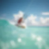 Thrill of Kiteboarding in Caribbean Waters A vibrant kiteboarder soaring through the turquoise waters of the Caribbean, showcasing the thrill of the sport.