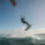 Dynamic kiteboarding action over the waves