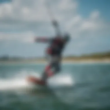 A skilled rider maneuvering a kiteboard on the water