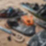 A detailed view of various used kiteboarding gear laid out for evaluation.