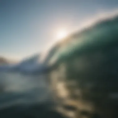 A scenic view of ocean waves with bright sunlight reflecting on water