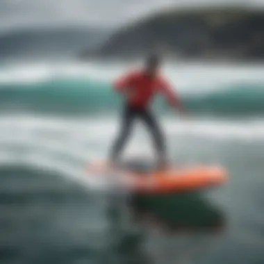 Rider maneuvering the Fanatic inflatable foil board over waves, demonstrating performance.