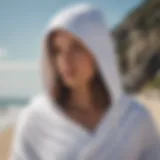 Stylish hooded change towel on the beach