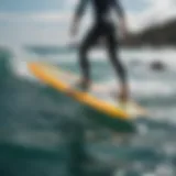 A hydro foil board gliding above water in a serene ocean setting