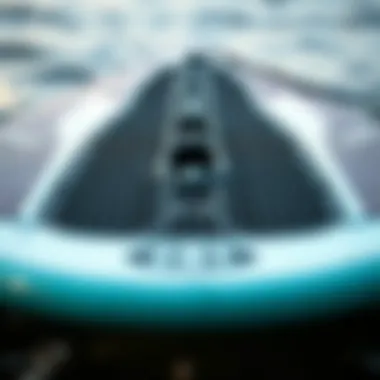 A close-up of a hydrofoil surfboard showcasing its intricate design