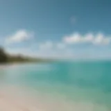 Kiteboarder gliding over turquoise waters