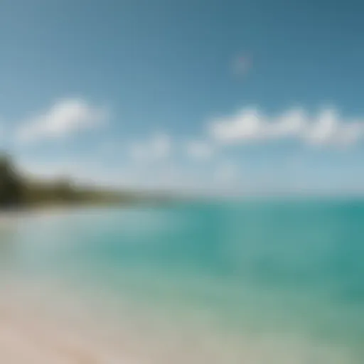 Kiteboarder gliding over turquoise waters