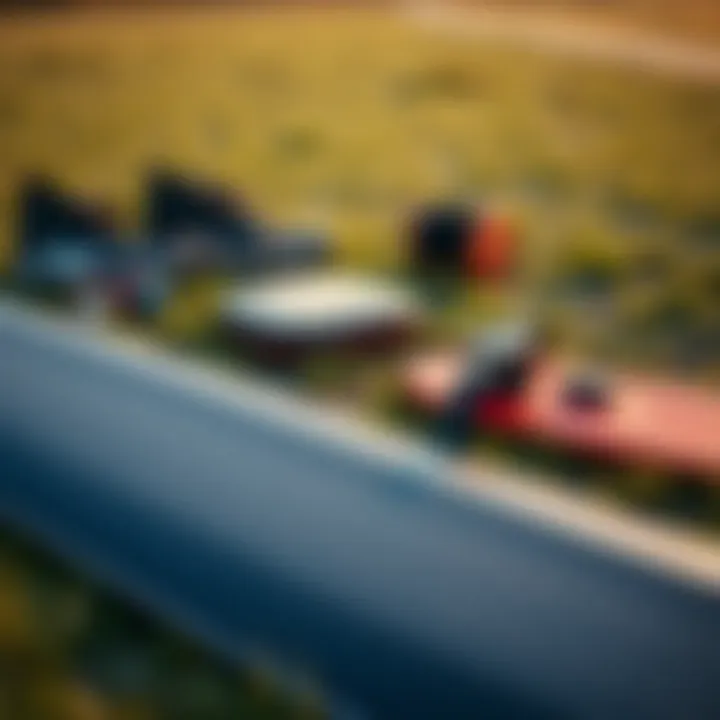 Essential Kite Landboarding Gear A close-up of essential kite landboarding equipment laid out on a grassy field.
