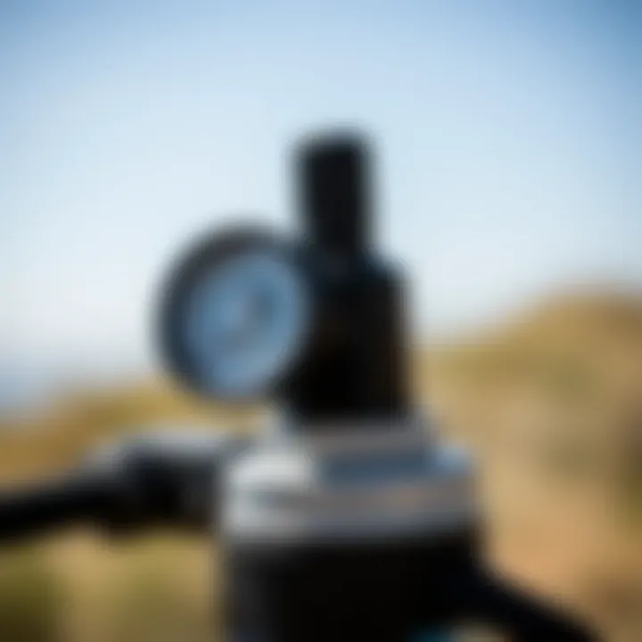 A close-up view of a high-quality kite pump showcasing its nozzle and pressure gauge.