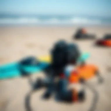 Essential kite surfing gear laid out on the beach