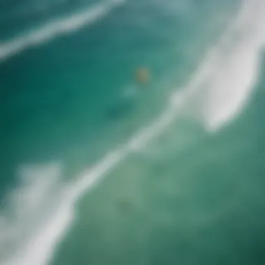 Aerial view of kite surfers enjoying the waves in Cancun