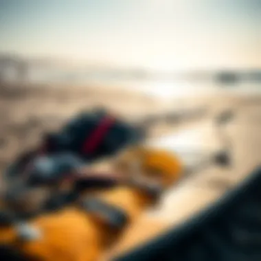 Kite surfing gear laid out on the beach