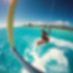 A breathtaking view of kiteboarding on turquoise waters with Anguilla's coastline in the background