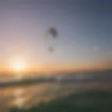 A vibrant kiteboarding scene at sunset