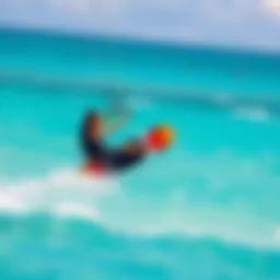 Kiteboarder gliding over turquoise waters