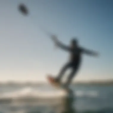 An expert kiteboarder performing tricks on the water with their kite