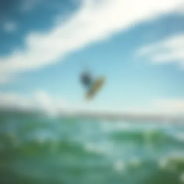 Aerial Tricks in Sarasota Kitesurfing A kitesurfer performing an aerial trick above clear waters