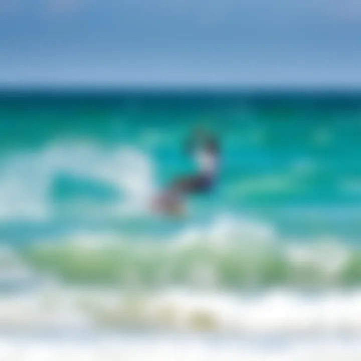 A kiteboarder skillfully maneuvering over the waves