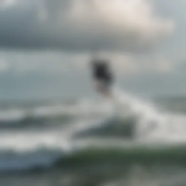 A kiteboarder gliding over the waves in Georgia's coastal waters